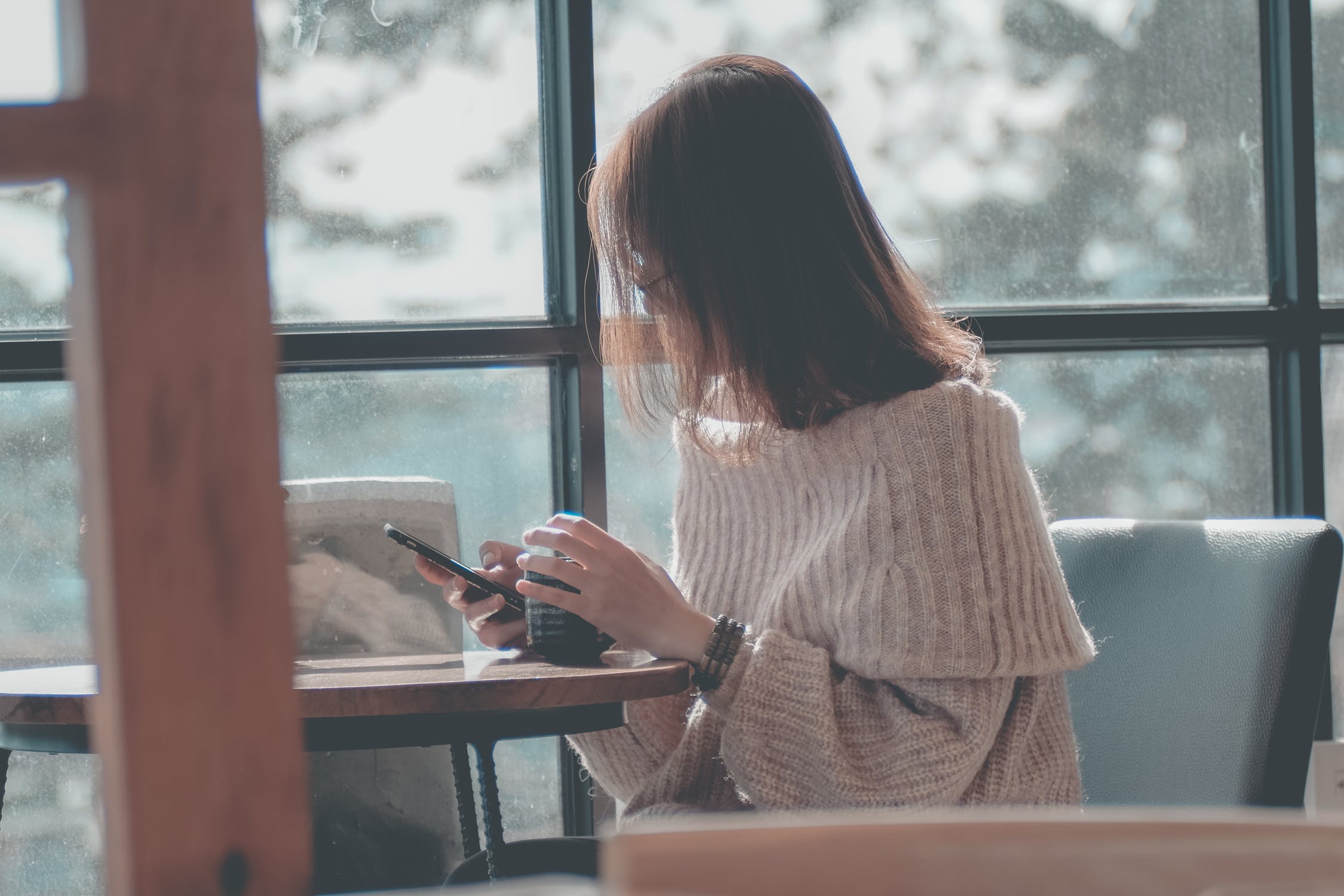 Woman reading SMS message